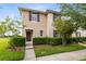 Charming two-story home with a well-manicured lawn and neatly trimmed hedges at 4801 Apple Blossom Ln, St Cloud, FL 34771