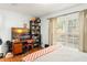 The bedroom has one window and a desk at 4820 S Conway Rd # 131, Orlando, FL 32812