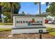 Attractive community sign displaying 'Sienna Place Condominiums' with colorful accents at 4820 S Conway Rd # 131, Orlando, FL 32812