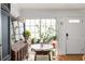 Charming dining area featuring a large window with plant decor, creating a bright and inviting atmosphere at 4820 S Conway Rd # 131, Orlando, FL 32812