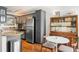 Well lit kitchen with stainless steel appliances and granite countertops at 4820 S Conway Rd # 131, Orlando, FL 32812