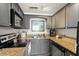 Corner kitchen with stainless steel appliances and laminate countertops at 4820 S Conway Rd # 131, Orlando, FL 32812