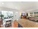 Open living space featuring a dining area, living room, and a view of the kitchen at 4820 S Conway Rd # 131, Orlando, FL 32812