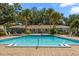 Large community pool with lounge chairs, offering a refreshing escape for residents at 4820 S Conway Rd # 131, Orlando, FL 32812