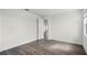 Bright bedroom featuring a closet and wood-look floors at 5227 Ligonberry St, Lakeland, FL 33811