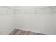 Walk-in closet featuring custom shelving at 5227 Ligonberry St, Lakeland, FL 33811