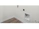 This laundry room features washer and dryer hookups at 5227 Ligonberry St, Lakeland, FL 33811
