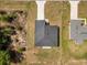 Overhead shot of new roof with skylights on a modern single-Gathering home in a neighborhood with mature landscaping at 5835 Sw 154 Lane Rd, Ocala, FL 34473