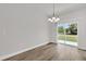 Bright dining room with sliding glass door leading to the backyard at 5835 Sw 154 Lane Rd, Ocala, FL 34473