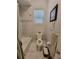 This is a brightly lit full bathroom with a combination tub and shower at 603 Sanctuary Golf Pl, Apopka, FL 32712