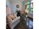 Comfortable living room with fireplace, cozy seating, and natural lighting at 603 Sanctuary Golf Pl, Apopka, FL 32712