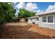Fenced backyard featuring a storage shed and plenty of open space at 6124 Bear Lake Ter, Apopka, FL 32703