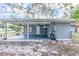 Outdoor covered patio space with ceiling fans offers comfortable outdoor seating or parking at 6124 Bear Lake Ter, Apopka, FL 32703