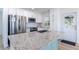 Modern kitchen boasts granite countertops and stainless steel appliances at 6124 Bear Lake Ter, Apopka, FL 32703
