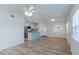 Spacious living room flows seamlessly into the updated kitchen at 6124 Bear Lake Ter, Apopka, FL 32703