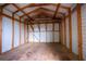Interior of storage shed featuring wooden studs and plywood floor at 6124 Bear Lake Ter, Apopka, FL 32703