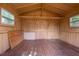 Shed interior with plank wood walls and floor at 6124 Bear Lake Ter, Apopka, FL 32703
