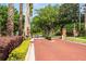 Gated entrance to the Glenmuir community, ensuring security and privacy, framed by lush landscaping at 6550 Crestmont Glen Ln, Windermere, FL 34786