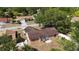 Aerial view of a home's backyard, patio, and fence at 7700 Greytwig Ln, Orlando, FL 32818