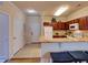Open-concept kitchen with breakfast bar seating and modern appliances at 8000 Tuscany Way # 4408, Davenport, FL 33896