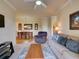 Inviting living room featuring a dining area, comfortable seating, and a stylish area rug at 8000 Tuscany Way # 4408, Davenport, FL 33896
