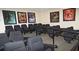 Private in-home movie theater featuring tiered seating and movie poster decor at 8000 Tuscany Way # 4408, Davenport, FL 33896