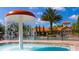 Fun mushroom water feature in the community pool area of the Tuscan-themed condos at 8000 Tuscany Way # 4408, Davenport, FL 33896