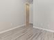 Spacious bedroom showcases neutral walls, stylish flooring, and ample natural light at 8058 Corkfield Ave, Orlando, FL 32832
