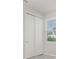 Bedroom with closet and window showing natural light at 8058 Corkfield Ave, Orlando, FL 32832