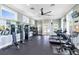 Well-equipped fitness center with modern exercise equipment and ample natural light for a healthy lifestyle at 8058 Corkfield Ave, Orlando, FL 32832