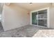 View of the home's patio with brick pavers and sliding glass doors to let in natural light at 8058 Corkfield Ave, Orlando, FL 32832