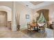 Elegant dining room featuring a chandelier and decorative rug, perfect for entertaining at 9138 Pinnacle Cir, Windermere, FL 34786