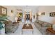 Spacious living room showcasing elegant furniture, tile floors, and an inviting open layout at 9138 Pinnacle Cir, Windermere, FL 34786
