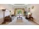 Bright living room with comfortable seating, pool view, and neutral décor creating a relaxing atmosphere at 9138 Pinnacle Cir, Windermere, FL 34786