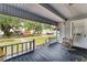 Front porch view with a rocking chair and view of the street at 1017 Florida Ave, St Cloud, FL 34769