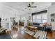 Spacious living room and dining area featuring hardwood floors and ample natural light at 1017 Florida Ave, St Cloud, FL 34769
