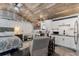 Open living space featuring a sleeping area, workspace, kitchenette, and modern finishes at 1017 Florida Ave, St Cloud, FL 34769