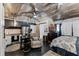 Unique living space with wood ceilings features a kitchenette and plenty of room to spread out at 1017 Florida Ave, St Cloud, FL 34769