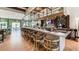 Stylish bar with modern seating and a fully stocked display at 2009 Tropical Palms Cir, Kissimmee, FL 34747