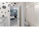 Bathroom featuring a granite vanity, an open doorway to a Star Wars themed bedroom and shower with white shower curtain at 2009 Tropical Palms Cir, Kissimmee, FL 34747