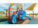 Colorful community playground with slides and climbing areas, perfect for Gathering fun and recreation at 2009 Tropical Palms Cir, Kissimmee, FL 34747
