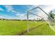 Expansive community soccer field with well-maintained green grass and blue skies on a sunny day at 2009 Tropical Palms Cir, Kissimmee, FL 34747