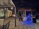 Amazing outdoor space featuring a tiki bar, grill, outdoor kitchen, and dining area, perfect for entertaining at 2174 Timber Creek Ln, Clermont, FL 34715