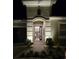 Stunning front entryway showcasing the architectural details and landscaping of the home at 2174 Timber Creek Ln, Clermont, FL 34715