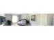 Calm bedroom features a Queen bed, neutral colors, and a large window at 2300 Painter Ln, Kissimmee, FL 34741