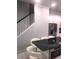 Kitchen bar top island with stainless steel appliances and barstool seating at 2300 Painter Ln, Kissimmee, FL 34741