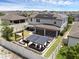 An aerial photograph of the home showing the fenced backyard with its covered patio and outdoor living area at 2751 Matera Dr, St Cloud, FL 34771