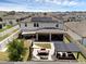 An aerial photograph of the property showing the back yard and the solar panels on the roof at 2751 Matera Dr, St Cloud, FL 34771
