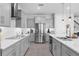 This modern kitchen is fully equipped with stainless steel appliances, ample storage, and plenty of counter space at 2751 Matera Dr, St Cloud, FL 34771