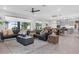 Expansive living room blending seamlessly into dining and kitchen areas, perfect for entertaining at 2751 Matera Dr, St Cloud, FL 34771